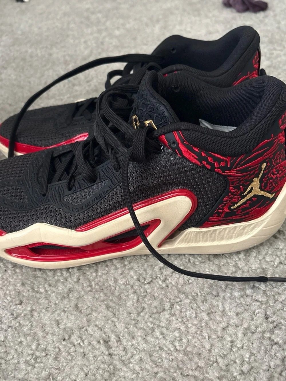 Jordan Men's Black and Red Low-Top Sneakers with Gold Logo